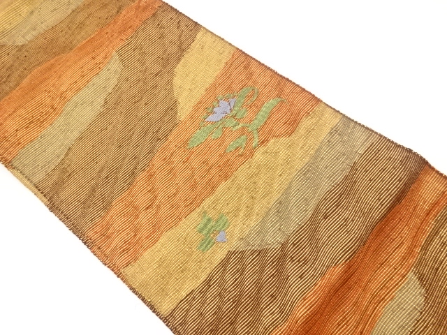 リサイクル　曲線に草花模様織出し名古屋帯